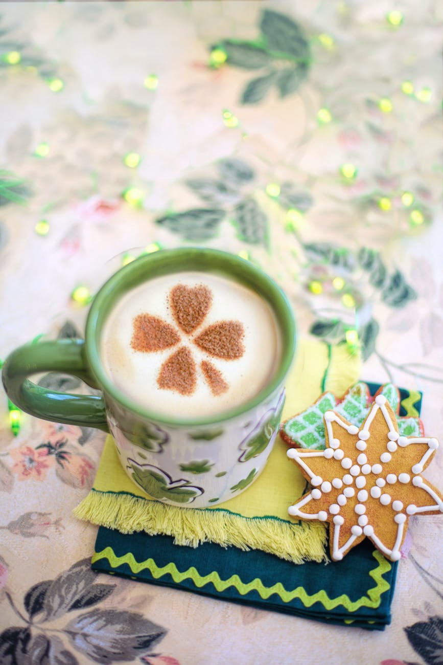 green ceramic mug with coffee